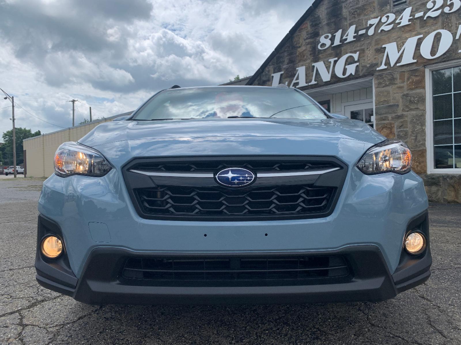 2018 Cool Gray Khaki /Black Subaru Crosstrek 2.0i Premium (JF2GTACC9J8) with an 2.0L L4 DOHC 16V engine, Automatic transmission, located at 821 Market Street, Meadville, PA, 16335, (814) 724-2500, 41.641064, -80.152435 - EXTREMELY clean, CARFAX 1-owner vehicle!! Power windows & locks, keyless entry, X-Mode, 17" alloy wheels, Subaru STARLINK Multimedia system with AUX/USB/BT, front/rear floor mats, fold down rear seats, privacy tinted rear windows, roof rack, rear backup camera, power moon roof, fog lamps, and NEW T - Photo #1