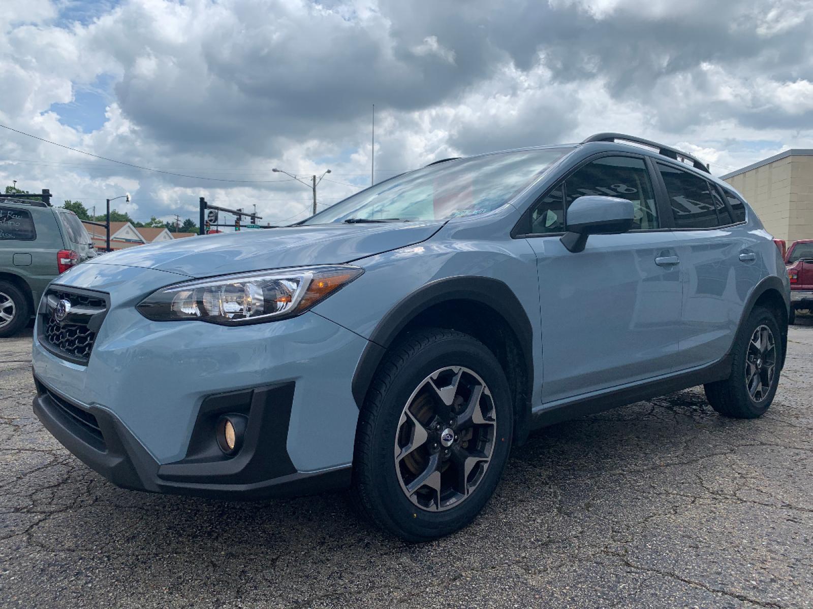 2018 Cool Gray Khaki /Black Subaru Crosstrek 2.0i Premium (JF2GTACC9J8) with an 2.0L L4 DOHC 16V engine, Automatic transmission, located at 821 Market Street, Meadville, PA, 16335, (814) 724-2500, 41.641064, -80.152435 - EXTREMELY clean, CARFAX 1-owner vehicle!! Power windows & locks, keyless entry, X-Mode, 17" alloy wheels, Subaru STARLINK Multimedia system with AUX/USB/BT, front/rear floor mats, fold down rear seats, privacy tinted rear windows, roof rack, rear backup camera, power moon roof, fog lamps, and NEW T - Photo #2