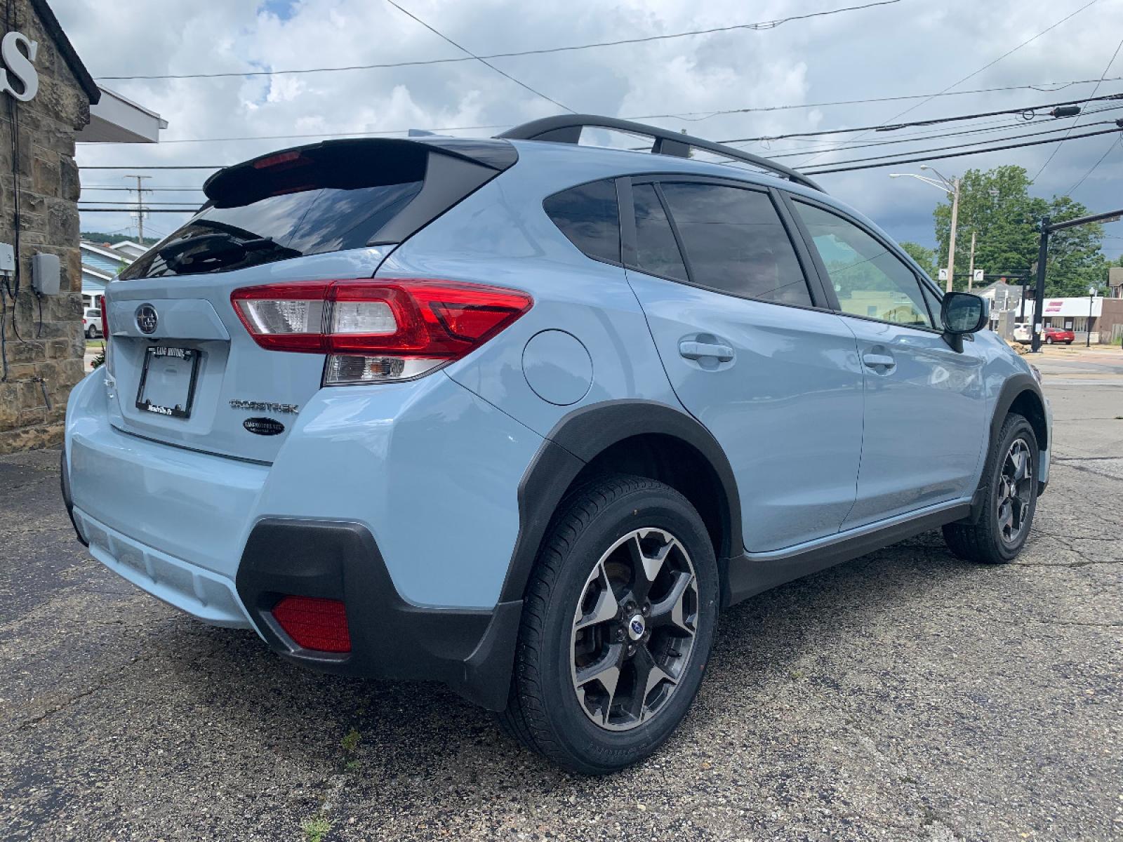 2018 Cool Gray Khaki /Black Subaru Crosstrek 2.0i Premium (JF2GTACC9J8) with an 2.0L L4 DOHC 16V engine, Automatic transmission, located at 821 Market Street, Meadville, PA, 16335, (814) 724-2500, 41.641064, -80.152435 - EXTREMELY clean, CARFAX 1-owner vehicle!! Power windows & locks, keyless entry, X-Mode, 17" alloy wheels, Subaru STARLINK Multimedia system with AUX/USB/BT, front/rear floor mats, fold down rear seats, privacy tinted rear windows, roof rack, rear backup camera, power moon roof, fog lamps, and NEW T - Photo #5